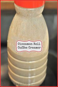 there is a small bottle that says cinnamon roll coffee creamer