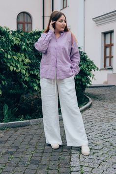 Linen button up shirt for women, lilac edwardian blouse, cottagecore blouse plus size.  Our reinterpreted classic shirt has a modern touch, it is timeless and super comfy for the body. The linen blouse will help create an elegant image for the office or easy and relaxed for a walk. DETAILS The shirt is designed for a loose fit! ◾collared linen shirt, features chest pockets, button down the front and a double-layered yoke with pleats at the back; ◾dropped shoulders, long sleeves with buttoned cuffs; ◾ the item has high-quality tailoring and neat seamy side. It designed and made to be timeless. The minimalist cut promotes convenience and ease. ◾ the fabric doesn't shrink. It doesn't sheer; ◾shown in a lilac colour SIZING TIP: ◾ Check your measurements to choose the best size for you and refe Buttoned Shirt Women, Lilac Button Down Shirt Outfit, Lavender Button-up Top For Fall, Purple Relaxed Fit Blouse For Daywear, Feminine Purple Cotton Blouse, Elegant Purple Cotton Blouse, Purple Relaxed Fit Long Sleeve Blouse, Purple Relaxed Fit Blouse For Spring, Purple Relaxed Fit Blouse With Buttons