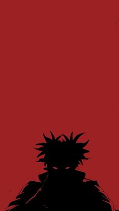 the silhouette of an anime character against a red background