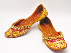 Ethnic Indian/Pakistani style shoes durable and hand stitched with genuine leather sole and leather padded cushion inside.t These gorgeous Khusa are in bright yellow with beautiful embroidery with mirror work. These have traditional Indian ghungru / Brass bells on top to add that extra Indian touch. They offer comfort and style, while still looking fabulous in these. Perfect or brides or everyday outfits. We offer many different designs of shoes to choose from. See our page for more of our colle Festive Summer Slip-on Flats, Summer Festive Slip-on Flats, Handwork Flats For Summer Festival, Handwork Flats For Festive Summer Occasions, Summer Festival Flats With Handwork, Bohemian Slip-on Flats For Festival, Festive Bohemian Slip-on Flats, Bohemian Slip-on Flats For Festive Occasions, Festive Slip-on Flats For Spring