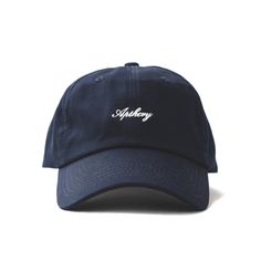 Elevate your style this summer with our Script Logo Hat! Navy dad hat features a contrasting white APTHCRY® embroidery on the front panel with an adjustable strap back. One size fits most. Adjustable Strap back Embroidery Logo Mid Profile Cap Product Photography, Cool Hat Designs, Minimalist Hat, Navy Ball, Cap Store, Racquet Club, Wife Style, Back Embroidery, Hat Aesthetic