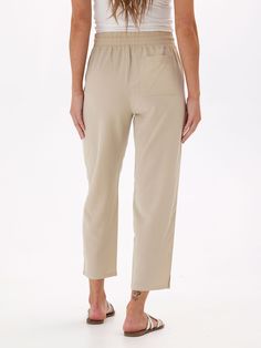 Made from a sustainable blend of Lyocell and Linen, the Winnie Woven Pant features a relaxed fit and elastic waistband. Comfortable Relaxed Fit Cropped Bottoms, Relaxed Fit Cropped Leg Comfortable Bottoms, Versatile Cropped Leg Loungewear Bottoms, Comfortable Relaxed Fit Cropped Pants, Casual Cropped Bottoms For Daywear, Casual Cropped Leg Bottoms For Daywear, Comfortable Cropped Pants With Elastic Waistband, Comfortable Cropped Leg Pants With Elastic Waistband, Solid Cropped Leg Loungewear Pants