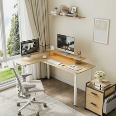 a computer desk with two monitors on it and a chair in front of the window