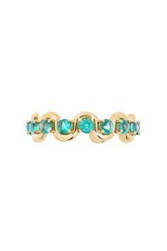 a gold ring with blue stones on it