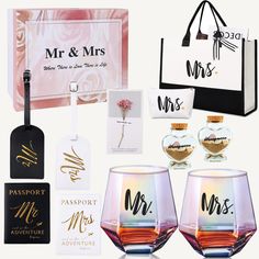 two wine glasses with matching bags and tags on the side, next to each other