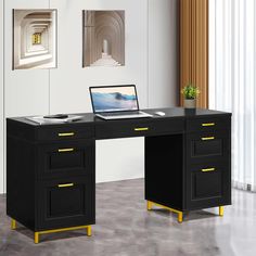 a black and yellow desk with a laptop on it