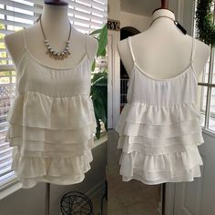 New Without Tags. Size: M Color:Cream Necklace Not Included Cute Ruffled Tank Top For Spring, Trendy Spring Camisole With Ruffles, Trendy White Ruffled Tank Top, Cute Ruffled Camisole Tank Top, Cute Ruffled Tank Top, Trendy Ruffled Cami Tank Top, Cute Ruffled Cami Top, Spring Camisole With Ruffles And Spaghetti Straps, White Camisole For Spring Layering