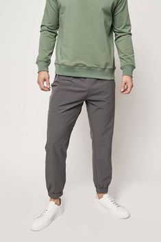 The jogger for the modern man. When you want to look polished but feel like you're wearing your favorite sweatpants. The EveryDay Jogger was made to move with you and pairs perfectly with your favorite t-shirt or crewneck. Perfect For: Running errands, casual lounging, grabbing a bite to eat Replaces: Sweatpants, golf pants, jeans Pairs With: EveryDay Crew, The Origin Tee Men’s Joggers Style, Brown Joggers Outfit, Athleisure Outfits Men, Joggers Men Outfit, Jogger Outfit Casual, Black Joggers Outfit, Brown Joggers, Jogger Pants Style, Striped Shirt Men