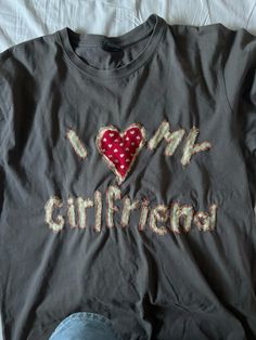 a shirt that says i love my girlfriend on it