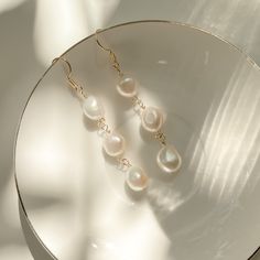 //About This Pair of Earrings// Carefully handcrafted for a minimalist and elegant statement. Perfect as wedding/bridal earrings or any other special moments to make a low-key but stunning statement. No one baroque pearlwill look the same, and that's the beauty of it. Each pearl is handpicked + completely unique. Gemstone: large 10-11mm baroque style freshwater pearls Closure: 14K gold vermeil (gold on silver) hook Dimensions: see product description //Freshwater Pearls// We meticulously choose White 14k Gold Filled Bridal Earrings As Gift, 14k Gold Filled White Bridal Earrings As Gift, Elegant Drop Linear Earrings As Gift, Handmade Elegant Long Drop Chandelier Earrings, Elegant Linear Drop Earrings For Gift, Fine Jewelry Teardrop Dangle Earrings For Wedding, Fine Jewelry Dangle Pearl Earrings For Wedding, Elegant Handmade Teardrop Linear Earrings, Minimalist Drop Earrings For Wedding