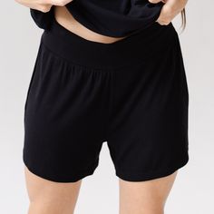 Shake up your loungewear with our Women’s Bamboo Rib-Knit Shorts. Featuring a thicker waistband that provides first-class coziness, these rib-knit bamboo shorts are crafted from a breathable bamboo viscose to keep your stems cool and carefree for a night of sleep or day of errands. No chafing, no riding up, no regrets. Wear them with our Women’s Rib-Knit Tee for a matching loungewear set. DETAILS: 97% Premium Viscose from Bamboo, 3% spandex Unique rib-knit viscose from bamboo fabric offers supre Solid Color Comfort Waistband Shorts For Loungewear, Comfy Solid Color Loungewear Shorts, Solid Color Cotton Pajama Shorts For Lounging, Loungewear Shorts With Ribbed Waistband, Comfortable Solid Pajama Shorts, Short Loungewear Shorts With Ribbed Waistband, Solid Color Shorts With Ribbed Waistband For Loungewear, Comfy Solid Color Short Bottoms, Comfy Relaxed Fit Shorts For Relaxation