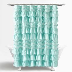 a shower curtain with ruffles on the bottom and bottom in aqua blue, against a white background