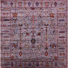 an area rug with various colors and designs