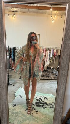 Get ready to wow in this Joie kimono top! With its big bell sleeves and one size fit, you'll feel effortlessly stylish and comfortable. No need for complicated sizing charts here, just throw it on and embrace your unique style in this playful top. One size fits all, and fun fits everyone! Oversized Bohemian Fall Cover-up, Oversized V-neck Spring Cover-up, Spring V-neck Tunic For Loungewear, Relaxed Fit Long Sleeve Top For Beach Cover-up, Spring Cotton Kimono For Beach Cover-up, Chic Flowy Top For Beach Cover-up, Hippie Kimono For Spring, Casual Fall Cover-up With Kimono Sleeves, Free Size Kaftan For Spring Beach Cover-up