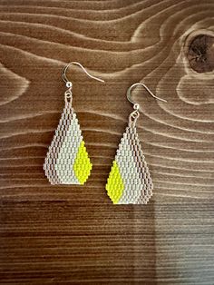 Teardrop earrings handmade from miyuki seed beads stitched together. Teardrop Earrings With Tiny Beads For Gift, Dangle Teardrop Earrings With Tiny Beads As Gift, Gift Teardrop Dangle Earrings With Tiny Beads, Yellow Teardrop Beaded Earrings With Colorful Beads, Gold Beaded Teardrop Earrings For Gift, Beaded Teardrop Earrings As Gift, Beaded Teardrop Earrings For Gift, Yellow Beaded Teardrop Earrings, Yellow Teardrop Beaded Earrings With Dangling Beads