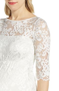 With a bit of shimmer and cut in a vintage style, this bump-flattering sheath of floral lace is simply perfect for weddings and other special events. Slips on over head Bateau neck Three-quarter sleeves Get the perfect fit—book an appointment with one of our alterations experts Lined 94% nylon, 6% spandex Dry clean Made in the UK Fitted Lace For Mother Of The Bride, Elegant Lace Top Dress For Wedding Night, Elegant Fitted Lace For Wedding Night, Mother Of The Bride Fitted Lace Dress, Tiffany Rose, Bateau Neck, Nordstrom Dresses, Three Quarter Sleeves, Sheath Dress