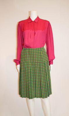 "Gorgeous Silk Skirt in bright green with magenta and yellow window pane check overlapping pattern. Drop Waist with flat pleats - so flattering!  No Maker Tag  Size: 4  Measures laying flat: 13.5\" across waist, 24\" waist to hem 100 % Silk" Green Pleated Workwear Skirt With Lining, Green Accordion Pleats Skirt, Green Pleated Skirt Lined For Workwear, Fitted Green Accordion Pleated Skirt, Green Fitted Skirt With Pleated Hem, Fitted Green Skirt With Pleated Hem, Retro Green Pleated Skirt, Overlapping Pattern, Magenta And Green