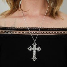 Embrace unique style with our Silver Gothic Cross Necklace. Elevate any outfit with this bold and elegant accessory. Stand out from the crowd with this one-of-a-kind piece that will add a touch of edgy sophistication to your wardrobe. Good to Know: Dainty chain that can be worn at a variety of lengths Our Charm Necklaces look incredible with our stunning Circle Earrings! Silver Plated  Charm Length 6mm x 4cm Diameter  Sizing Choker - 12-14" (Extendable), Short necklace - 16" Long necklace - 20" Edgy Metal Cross Jewelry, Edgy Cross-shaped Metal Jewelry, Silver Cross Pendant Jewelry For Party, Silver Cross Pendant Necklace For Party, Silver Cross Jewelry For Party, Bohemian Cross Jewelry For Party, Silver Cross Necklace For Party, Trendy Cross Jewelry For Party, Gothic Cross Pendant Jewelry For Party