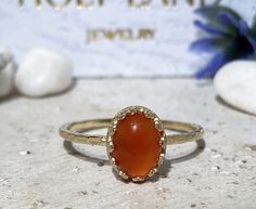 Don't miss this opportunity to own this beautiful gemstone ring crafted in 14k gold filled => Gemstone Type - Carnelian => Gemstone Size - 6*8 mm => Gemstone Cut - Cabochon => Metal Type - 14k Gold Filled (Tarnish Resistant And Nickel Free) - also available in 925 sterling silver * Please contact me for pricing on a sizes larger than 11 * ~ Feel free to ask me about custom made designs. ❏ Replacements and custom orders : ✪ 925 sterling silver - no additional cost ✪ 14k rose gold fill Handmade Oval Moonstone Ring In 14k Gold, Handmade 14k Gold Oval Moonstone Ring, Untreated Oval Ring In Fine Jewelry Style, Untreated Oval Ring Fine Jewelry, Untreated Oval Rings Fine Jewelry, Handmade Oval Yellow Gold Stackable Rings, Untreated 14k Gold Oval Ring, Handmade 14k Gold Oval Rings, Oval Untreated 14k Gold Ring