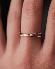 A captivating set of two interlocking bands that blend modern elegance with artisanal craftsmanship.The beauty of this ring lies in its organic shape. This ring will look slightly different from every angle. Whether as a meaningful gift for a loved one or a distinctive addition to your own collection, these interlocking rings are a symbol of unity, resilience, and the beauty found in embracing life's twists and turns. This listing is for one single Interlocking ring set made up of 2 INDIVIDUAL R Modern Twist Hand Forged Open Ring Jewelry, Interlocking Ring Set, Modern Twist Open Ring In Sterling Silver, Modern Twist Silver Open Ring Jewelry, Interlocking Circles Silver Necklace, Interlocking Rings, Interlocking Ring, Rings Sterling Silver, 2 Rings