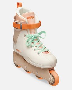 an orange and white roller skate with laces on the bottom, in front of a white background