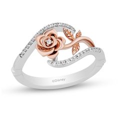 Enjoy the whimsical yet romantic design of this diamond bypass rose ring from the Enchanted Disney Fine Jewelry Collection inspired by Belle. Crafted in sterling silver A 10K rose gold flower sparkles with a single diamond inside the bloom. Bypassing ribbons of shimmering diamonds highlight the sideways centrepiece. This ring captivates with 1/10 ct. t.w. of diamonds. ©Disney Basic Rings, Disney Rings, Enchanted Disney, Enchanted Disney Fine Jewelry, Disney Belle, Disney Fine Jewelry, Jewellery Ring, Rose Gold Flower, Gold Book