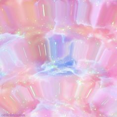 an abstract pink and blue background with lots of sparkles on the bottom half of it