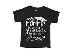 My Mommy is a Graduate Shirt, She Did It For Me We use black Bella and Canvas' toddler and youth shirts for the BEST quality, soft feel and a non-boxy look.  -------- T E E  S I Z E S * 3-6 months * 6-12 months * 12-18 months * 18-24 months * 2T * 3T * 4T * 5T * Youth Small * Youth Medium * Youth Large * Youth X-Large  LOOK THROUGH PHOTOS FOR SIZE CHARTS  If you're needing a different size, please message me! I'll be happy to accommodate.  -------- Thank you for supporting Jewel and Bella! Black Graphic Print T-shirt For Graduation, Black T-shirt With Graphic Print For Graduation, Black Letter Print Shirt For Graduation, Black Shirt With Letter Print For Graduation, Black Crew Neck Top For Graduation, Baby Clothes Country, She Did It, Graduation Shirts, Baby Crafts