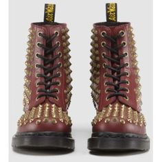 The 1460 is the original Dr. Martens boot. Its instantly recognizable DNA looks like this: 8 eyes, classic Dr. Martens Smooth leather, grooved sides, a heel-loop, yellow stitching, and a comfortable, air-cushioned sole. This limited edition features ox-gold spikes. Original 8-eye boot Built on the iconic Dr. Martens air-cushioned sole, which is oil and fat resistant with good abrasion and slip resistance Use Dr. Martens' Wonder Balsam to keep your boots clean, protect the leather, and keep it so Dr Martens Shop, Doc Martens, Cherry Red, 404 Page Not Found, Dr. Martens, Step Up, Smooth Leather, Limited Edition, Cherry