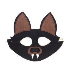 a black mask with brown ears and white teeth