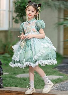 Chinese Style Green Stand Collar Embroideried Lace Patchwork Tulle Kids Long Dresses Short SleeveFabric: TulleSize Fit:Fit: This garment fits true to size.Length: Size 120 measures 72cm from shoulder to hemBust:The bust size for size 120 measures around 68cmWash: Hand Wash Cold. Spring Green Princess Dress For Fancy Dress, Spring Green Princess Dress With Short Sleeves, Green Princess Dress For Spring Fancy Dress, Green Short Sleeve Princess Dress For Party, Princess Style Short Sleeve Lace Dress, Green Fitted Princess Dress With Short Sleeves, Green Princess Style Short Sleeve Dress, Green Princess Short Sleeve Dress, Princess Style Short Sleeve Costume Dress