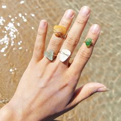 Handmade wure wrapped rings with recycled seashells and sea glass found on florida beaches. These rings are made with 18k gold filled wire so they are naturally water proof and will not tarnish. Select your correct ring size for purchase. Minimalist Beach Ring Jewelry, Minimalist Beach Jewelry Ring, Gold Ocean-inspired Rings For Beach, Gold Sea Glass Wire Wrapped Jewelry, Gold Wire Wrapped Sea Glass Jewelry, Ocean-inspired Shell Rings For Beach, Bohemian 14k Gold Filled Jewelry For Beach, Adjustable Ocean-inspired Sea Glass Jewelry, Handmade Shell Ring For Beach