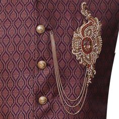 Description This maroon jamawar waistcoat from Uomo Clothing is the perfect way to add a touch of luxury to your special event attire. Made from premium quality Jamavar fabric, this vest is sure to turn heads. The hand-embellished look adds a touch of sophistication, while the golden brass buttons and triple layer chain give it a sharp, modern look. The round-bottom fashion and semi-circular binding complete the look, making this waistcoat a great choice for any special occasion.Advantages: Look Elegant Jamawar Nehru Jacket With Traditional Drape, Elegant Embroidered Jamawar Nehru Jacket, Elegant Nehru Jacket In Jamawar With Traditional Drape, Elegant Nehru Jacket With Intricate Embroidery For Diwali, Elegant Embroidered Festive Vest, Elegant Festive Vest For Wedding, Elegant Festive Wedding Vest, Designer Wear Elegant Nehru Jacket For Festivals, Elegant Designer Nehru Jacket For Festivals