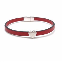 "Beautiful and simple - Love is all there is This bracelet is made with high quality European leather that is 5mm wide. The charm and magnetic clasp on this bracelet are made of zinc plated with 999 silver. It is lead and nickel free and hypoallergenic. The magnetic clasp has \"security nubs\" on the inside so you have to lift one end of the clasp to remove the bracelet. It is an added security feature to keep from losing your bracelet. The leather is a beautiful and is available in many colors. Silver Bracelets With Magnetic Closure As Gift, Silver Bracelet With Magnetic Closure As Gift, Modern Leather Bracelet With Magnetic Clasp As Gift, Modern Magnetic Leather Bracelet As Gift, Modern Leather Bracelet With Magnetic Closure, Magnetic Leather Bracelet As Gift, Magnetic Leather Bracelets As Gift, Leather Magnetic Bracelets As Gift, Red Leather Bracelet