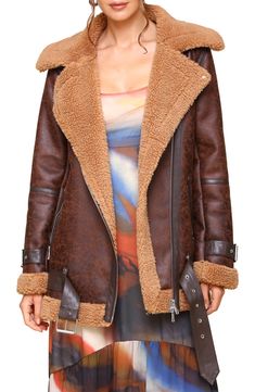 Rev the engines on rugged style with a swaggy biker jacket made from sturdy faux shearling. 29 1/2" length (size Medium) Asymmetric zip closure Notched lapels Belted cuffs Chest zip pocket; front zip pockets Removable belt 100% polyester faux shearling Dry clean Imported Rugged Style, Fabric Gift Bags, Nordstrom Store, Fabric Gifts, Free Fabric, Biker Jacket, Fur Coat, Zip Pockets, Bomber Jacket