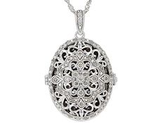 0.45ctw round white diamond, rhodium over sterling silver oval locket pendant. Suspends from an 18 inch Singapore chain with a lobster claw clasp closure. Measures approximately 1 & 3/8"L x 15/16"W and has a 2.00mm bail. White Gold Filigree Necklace In Oval Shape, White Gold Oval Filigree Necklace, Oval White Gold Filigree Necklace, Oval Diamond Filigree Necklace, Oval Diamond Filigree Jewelry, Oval Pendant Filigree Jewelry For Anniversary, Anniversary Filigree Oval Pendant Jewelry, Anniversary Oval Pendant Filigree Jewelry, Diamond White Jewelry With Diamond Accents, Oval Pendant