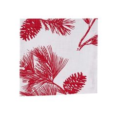 a red and white napkin with pine cones on it