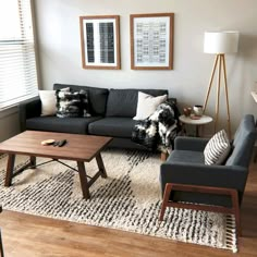 the living room is clean and ready to be used as a den or home office