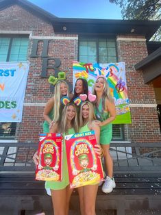 the girls are posing with their bags of cereal