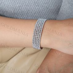 All Our Bracelets Are Made Of REAL 14K GOLD  14K White Gold Large Multi Row Sparkly Bracelet, 14 mm Thick, 7" Inch, Statement Bracelet, Red Carpet Bracelet, Real Gold Bracelet, Women  Shop our 14K Bracelets https://www.etsy.com/shop/GOLDMANIA?ref=seller-platform-mcnav§ion_id=26925987  Shop On Sale items https://www.etsy.com/shop/GOLDMANIA?ref=seller-platform-mcnav§ion_id=1  Metal: 14K White Gold, 14K Two Tone Gold Width: 14 mm   Length: 7" Closure: Slide clasp  Weight: 23.80 Gram  SHIPPED FROM N Luxury Polished Gold-colored Sterling Silver Bracelet, Luxury White Gold Chain Bracelet, Tarnish Resistant, Gold-tone Stainless Steel Bracelets With Jubilee Bracelet, Gold Cubic Zirconia Multi-stone Bracelets, Gold-tone Cubic Zirconia Bracelet, Real Gold Bracelet, Sparkly Bracelets, Gold Link Chain, Christmas Gift Jewelry