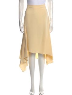 St. John Silk SkirtYellowZip ClosureFit:Skirts by St. John typically fit true to size. Elegant Long Yellow Skirt, Fitted Yellow Pencil Skirt For Spring, Elegant Yellow Pencil Skirt, Elegant Yellow Maxi Skirt, Elegant Flowy Yellow Skirt, Elegant Yellow Flowy Skirt, Yellow Knee-length Pencil Skirt For Spring, Fitted Flared Yellow Maxi Skirt, Elegant Yellow Skirted Bottoms