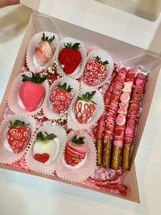 a box filled with lots of different types of strawberries and chocolate covered strawberries