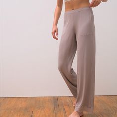 Soma Model Pull On Ribbed Pants With Lace Bottom. The Incredibly Soft Modal Silky Fabric Is Designed To Keep You Comfy While Sleeping Or Lounging With A Stretch That Moves With You. In Addition, It Has A Beautiful Drape And Is Wrinkle-Resistant So You'll Always Look Fresh. Pants Details: Ribbed Detail Lace Detail Front Pockets Flat Waistband 30" Inseam. 93% Rayon, 7% Spandex. Modal Blend. Machine Wash. Imported. Color: Smokey Taupe Msrp: $59 Brand New With Tags Factory Sealed I Comfortable Stretch Wide Leg Sleepwear, Seamless Stretch Bottoms For Lounging, Stretch Wide-leg Lounging Pants, Stretch Wide-leg Loungewear Pants, Stretch Wide-leg Pants For Loungewear, Stretch Wide-leg Lounge Pants, Stretch Wide Leg Sleepwear For Loungewear, Stretch High-waisted Pants For Daywear, Casual Soft Touch Bottoms For Yoga