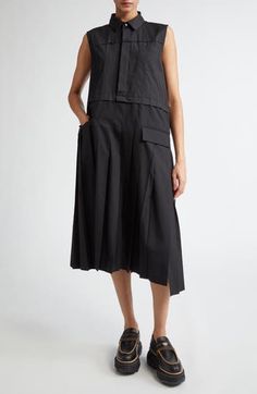 Chitose Abe's signature blend of opposing aesthetics shines in the suiting-inspired pleated skirt and contrasted utility-style bodice of this sleeveless midi. Hidden-button half placket Spread collar Sleeveless Chest patch pocket; front flap pockets Cotton/polyester Dry clean Made in Japan Designer Clothing Asian & Pacific Islander Owned/Founded Chic Workwear Pleated Dress With Box Pleat, Chic Box Pleat Pleated Dress For Work, Chic Sleeveless Work Dress With Pockets, Chic Pleated Sleeveless Dress For Work, Chic Sleeveless Box Pleated Dress, A-line Sleeveless Dress With Pockets For Work, Summer Workwear Pleated Dress With Box Pleat, Black Sleeveless Dress With Accordion Pleats, Workwear Sleeveless Midi Dress With Pleated Bodice