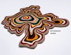 a rug with an abstract design on it