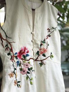 ❤ The beige linen hand embroidered dress is very soft, skin friendly, breezy and comfortable.  ❤ Item description: - A lovely dress with embroidered bird and flowers motifs. - Material: linen, buttons, embroidery threads. - Environmentally friendly. - This dress is very useful, go with any outfit, that can be used to go to school, go out, go shopping.    It is a perfect gift for yourself or your beloved.  ❤ Care instructions:       The best way to wash embroidery cloth is to put it in soapy water (with a mild detergent and cold water at 86 ºF/30oС) for 20 minutes. Try to not wash the item with other clothing that might cause damage, such as zippers, buttons or different colors. You wash it by hand, and if you have dirty patches on your garment, you can gently rub them, it's best not to rub Casual Floral Embroidery Dress, Casual Cotton Embroidered Dress, Summer Party Dress With Resham Embroidery, Spring Embroidered Cotton Dress, Cheap Cotton Embroidered Dress With Short Sleeves, Cheap Embroidered Women's Dresses, Cheap Embroidered Hem Dress For Summer, Luxury Cotton Embroidered Summer Dress, Cheap Cute Embroidered Dresses