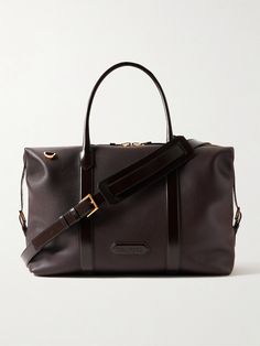 TOM FORD's holdall is constructed from a combination of pebble-grain and smooth leather that'll last through years of travel. Suitable for long weekends or overnight work trips, it's sized to fit two changes of clothes, plus your wash bag and laptop. The detachable shoulder strap allows you to go hands-free. Luxury Leather Duffle Bag For Work, Luxury Briefcase For Overnight Trips, Luxury Workwear Duffle Bag, Leather Holdall, Tom Ford Bag, Ford Accessories, Luxury Sneakers, Stylish Watches, Wash Bag