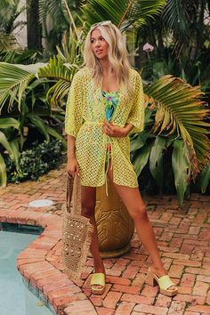 - Sunny days are not far away with this vibrant swimsuit cover-up! - Woven material - An open draped neckline - ¾ length loose sleeves - An elastic drawstring cinched waistline with tie closure - A relaxed silhouette that ends in a straight hemline Loose Sleeves, Draped Neckline, Swimsuit Cover, Sunny Days, Sunnies, Cover Up, Elastic, Luxury Fashion, Knitting