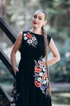 Women's dress with a modern cut. The top is fitted, the back has a V-shaped neckline. The skirt is full and consists of 4 flared wedges. There is a belt along the waistline. The dress is decorated with satin stitch embroidery of floral arrangements. The front part is also decorated with a bouquet of embroidered flowers. Fabric - black viscose. Embroidery technique - artistic satin stitch. Author's design. Size S-M. In stock. As this office dress will be made for order, please provide your body measurements - bust, waist, hips, length of the sleeve, length of the item and your height. More embroidered dresses, please look here: https://www.etsy.com/shop/Handembroiderykvitka?ref=seller-platform-mcnav§ion_id=24634970 More items form my shop https://www.etsy.com/shop/Handembroiderykvitka Thank Office Dresses, Loose Dress, Handmade Dresses, Everyday Dresses, Floral Midi Dress, Embroidered Dress, V Shape, Boho Dress, Dress Clothes For Women