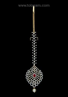 18 karat gold "detachable" diamond maang tikka cum pendant - papidi billa with color stones & south sea pearls
  this product can be used as pendant.
  this product has inter changeable stones in the pendant.
  gross weight of the pendant without chain : 10.400 grams
  gross weight of the diamond tikka chain without pendant : 4.850 grams
  length of the pendant : 2.30 inches
  width of the pendant :  1.30 inches
 - 235-GT493 - in 15.250 Grams for USD $3,575.74 USD. 
Made in India by Totaram Jewe Elegant Yellow Gold Tikka For Festivals, Elegant Yellow Gold Tikka For Diwali, Traditional Kundan Necklace With Single Cut Diamonds For Reception, Elegant 22k Gold Tikka For Festivals, Elegant 22k Gold Tikka For Diwali, Traditional Kundan Jewelry With Single Cut Diamonds, Traditional Pendant Jewelry With Diamond Accents, Yellow Gold Diamond Jewelry With Stone Work, 22k Gold Jewelry With Diamond Accents For Wedding